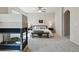Bright primary bedroom featuring a fireplace and plush carpet at 12925 Grant Cir # A, Thornton, CO 80241