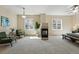 Open floor plan bedroom with modern decor and a stylish fireplace at 12925 Grant Cir # A, Thornton, CO 80241