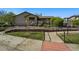 Community clubhouse with stone accents and landscaped walkway for easy access at 12925 Grant Cir # A, Thornton, CO 80241