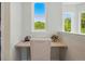 Hallway with workstation including a beautiful view from the window at 12925 Grant Cir # A, Thornton, CO 80241