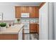 Kitchen with modern appliances, light countertops and stainless steel sink at 12925 Grant Cir # A, Thornton, CO 80241