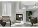 Living room features fireplace, neutral decor and hardwood flooring at 12925 Grant Cir # A, Thornton, CO 80241