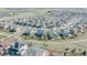 Expansive aerial view showcasing a well-planned community with modern homes and landscaping at 7665 Grady Cir, Castle Rock, CO 80108