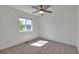This bedroom provides lots of natural light and a nice view from the window at 7665 Grady Cir, Castle Rock, CO 80108