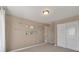 Neutral bedroom featuring plush carpet, artwork, and a double door closet at 7665 Grady Cir, Castle Rock, CO 80108