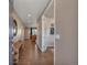 Inviting entryway with hardwood floors leads into living area with lots of natural light at 7665 Grady Cir, Castle Rock, CO 80108