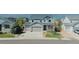 Charming two-story home featuring a three-car garage and well-maintained landscaping at 7665 Grady Cir, Castle Rock, CO 80108