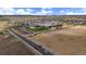 Aerial view of the neighborhood school with a sports field and parking lot at 14268 Hop Clover Trl, Parker, CO 80134