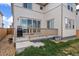 View of the backyard with a patio, a grill, and siding on the house at 14268 Hop Clover Trl, Parker, CO 80134