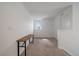 Bright hallway with a bench under the window at 14268 Hop Clover Trl, Parker, CO 80134