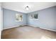 Bedroom with light blue walls and carpet flooring at 2695 S Ammons Way, Lakewood, CO 80227