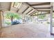 Covered patio with flagstone flooring and skylight at 2695 S Ammons Way, Lakewood, CO 80227