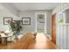 Bright dining room featuring hardwood floors, stylish decor, and an inviting atmosphere at 4712 Perry St, Denver, CO 80212