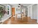 Bright dining room with hardwood floors, a ceiling fan, and natural light at 4712 Perry St, Denver, CO 80212