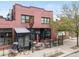 Restaurant exterior showing the front facade, outdoor seating area, and signage at 4712 Perry St, Denver, CO 80212