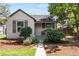 Charming single-Gathering home with a manicured front yard and cozy porch seating, perfect for relaxing outdoors at 4712 Perry St, Denver, CO 80212