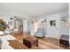 Bright, airy living room with hardwood floors, stylish furnishings, and an open layout at 4712 Perry St, Denver, CO 80212