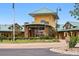 Stunning golf club with stone accents, lush landscaping, and a welcoming entrance at 7426 E 148Th Pl, Thornton, CO 80602