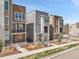 Exterior elevation showcases multi-tone facades, professional landscaping and a walkway to the front doors at 3560 Corsica Way, Castle Rock, CO 80109