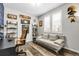 Office features a comfortable daybed, modern decor, and hardwood flooring at 3560 Corsica Way, Castle Rock, CO 80109