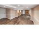 Finished basement with wood-look floors, recessed lighting, and a built-in bar at 10606 Cottoneaster Way, Parker, CO 80134