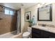 Basement bathroom with shower, toilet and granite vanity at 3560 N Columbine St, Denver, CO 80205