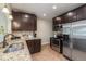 Modern kitchen with stainless steel appliances and granite countertops at 3560 N Columbine St, Denver, CO 80205