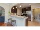 Modern kitchen island with granite countertop and breakfast bar at 3560 N Columbine St, Denver, CO 80205