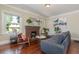 Cozy living room with hardwood floors, fireplace and lots of natural light at 3560 N Columbine St, Denver, CO 80205