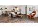 Inviting living room with hardwood floors and an open layout to the kitchen and dining area at 94 Spring Ln, Boulder, CO 80302
