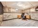 Finished basement with a built-in desk area is ideal for a home office at 11123 Clermont Dr, Thornton, CO 80233