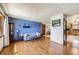 Stylish living room with hardwood floors and bright walls, showcasing a modern design at 11123 Clermont Dr, Thornton, CO 80233