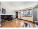 Entry way with a large window allowing an abundance of natural light and hardwood floors at 11123 Clermont Dr, Thornton, CO 80233