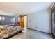 Primary bedroom offering carpet flooring, baseboard trim and a closet at 11123 Clermont Dr, Thornton, CO 80233