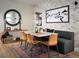 Stylish dining room features a modern table and built-in bench at 2515 W 69Th Pl, Denver, CO 80221