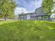 This home has a large backyard and a hot tub for relaxation at 9430 Carr St, Westminster, CO 80021