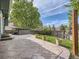 Spacious backyard patio with a hot tub and well-maintained lawn at 9430 Carr St, Westminster, CO 80021