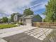 Inviting exterior with an attached garage, concrete driveway, and drought-tolerant landscaping at 9430 Carr St, Westminster, CO 80021