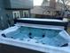 Inviting, partially uncovered hot tub in backyard promises relaxation and enjoyment at 9430 Carr St, Westminster, CO 80021