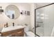 Modern bathroom with a glass enclosed shower, sleek vanity, and stylish fixtures at 1698 Odyssey Ct, Castle Rock, CO 80109