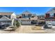 Inviting two-story home boasts a well-manicured lawn and a convenient attached two-car garage at 1698 Odyssey Ct, Castle Rock, CO 80109