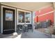 Charming front porch with seating area offers an inviting entrance to the home at 1698 Odyssey Ct, Castle Rock, CO 80109