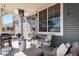 Outdoor patio with comfortable seating and a grill, perfect for entertaining and enjoying the outdoors at 1698 Odyssey Ct, Castle Rock, CO 80109