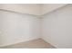 Walk-in closet with ample storage space, rod, and neutral carpet at 5204 Shetland Ct, Highlands Ranch, CO 80130