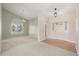 Open living room featuring vaulted ceilings, carpet floors and large picture windows offering plenty of natural light at 5204 Shetland Ct, Highlands Ranch, CO 80130