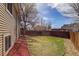 Large, grassy backyard with a fenced perimeter, great for Gathering fun and privacy at 3969 S Fundy Cir, Aurora, CO 80013