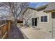 Cozy backyard patio area, perfect for outdoor relaxation and easy access through sliding glass doors at 3969 S Fundy Cir, Aurora, CO 80013