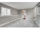 Spacious basement area with neutral paint, new carpet, and a window for plenty of natural light at 3969 S Fundy Cir, Aurora, CO 80013