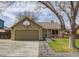 Charming home featuring a two-car garage, basketball hoop and attractive landscaping at 3969 S Fundy Cir, Aurora, CO 80013