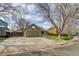 Charming home with a two-car garage, basketball hoop and well-manicured lawn at 3969 S Fundy Cir, Aurora, CO 80013